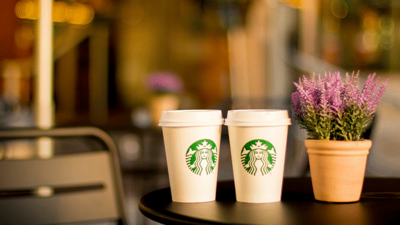 starbucks cups on a cafe table