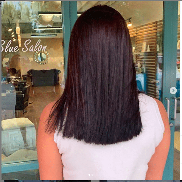After photo of color correction with dark purple hair
