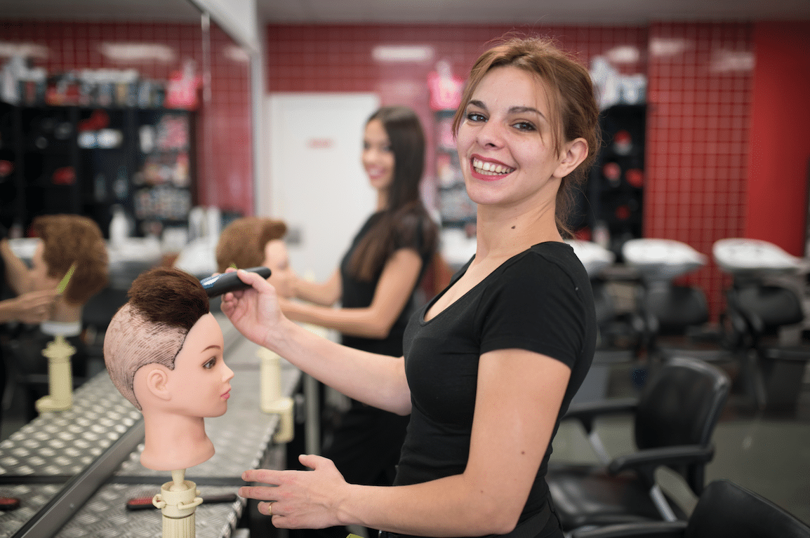 Woman learning in beauty school
