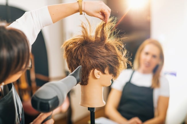 blow drying mannequin hair demonstration