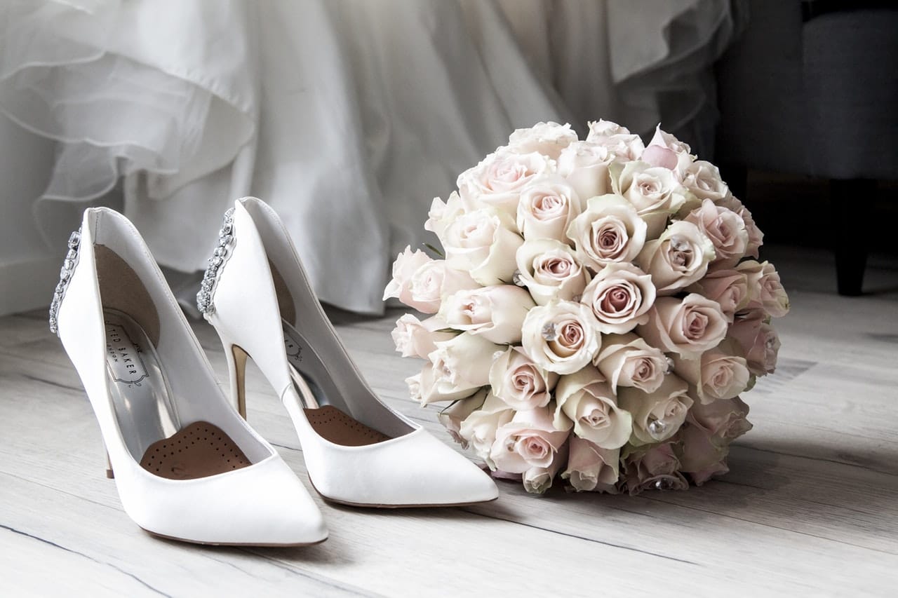 wedding shoes and a bouquet