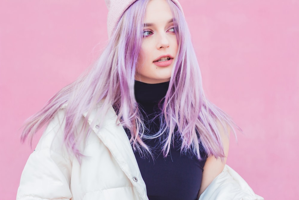 girl wearing hat with purple hair